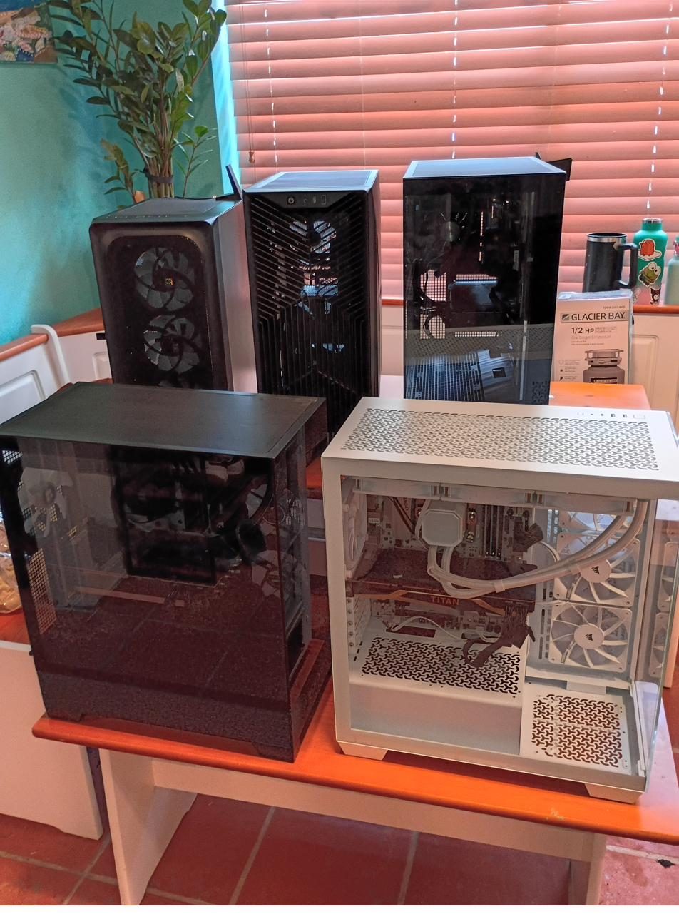 Lineup of five completed custom PC builds
