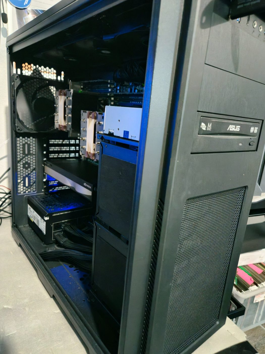 Phanteks EEB server tower with the side panel off, showing drive cages and the optical drive
